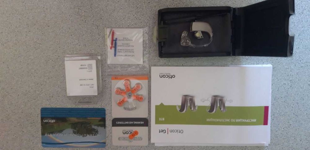 Продам слуховой аппарат Oticon. Новый