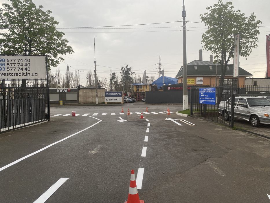 Нанесение дорожной разметки. Разметка парковок.