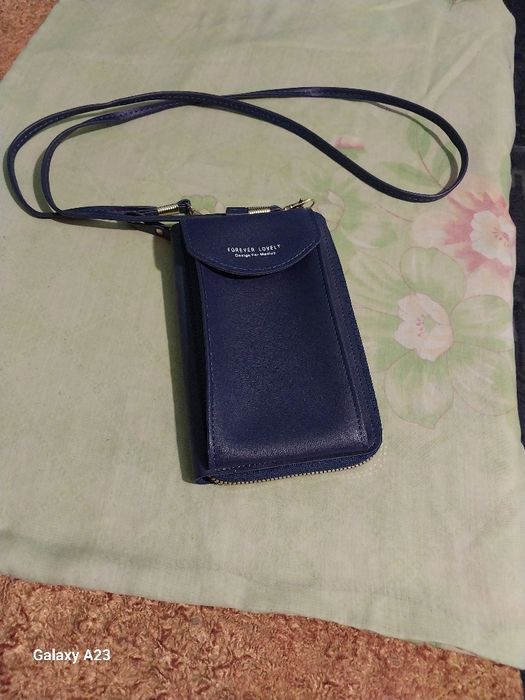 Клач-гаманець новий