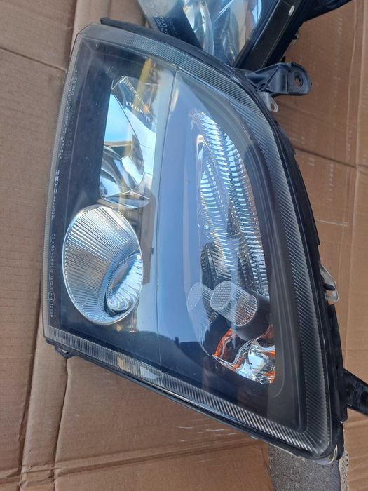 Lampy przód Opel Vectra c