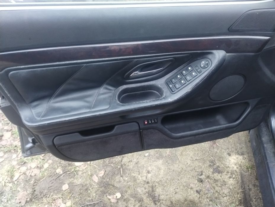 BMW e38 boczki drzwi skóra szyte rączki komplet