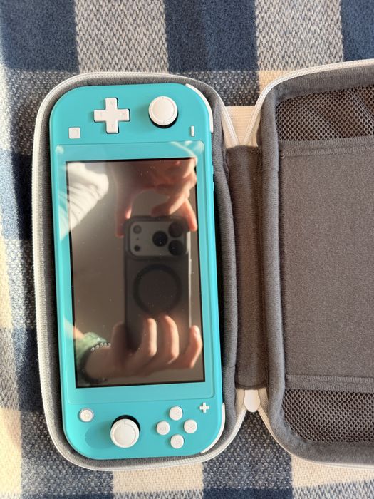 Nintendi switch lite torquesa