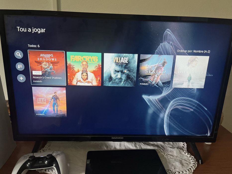 Ps5 dois comandos conta com varios jogos …… tem fifa 26