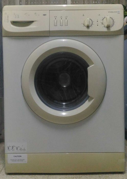 Maquina de lavar roupa em perfeito estado de uso e conservacao.
