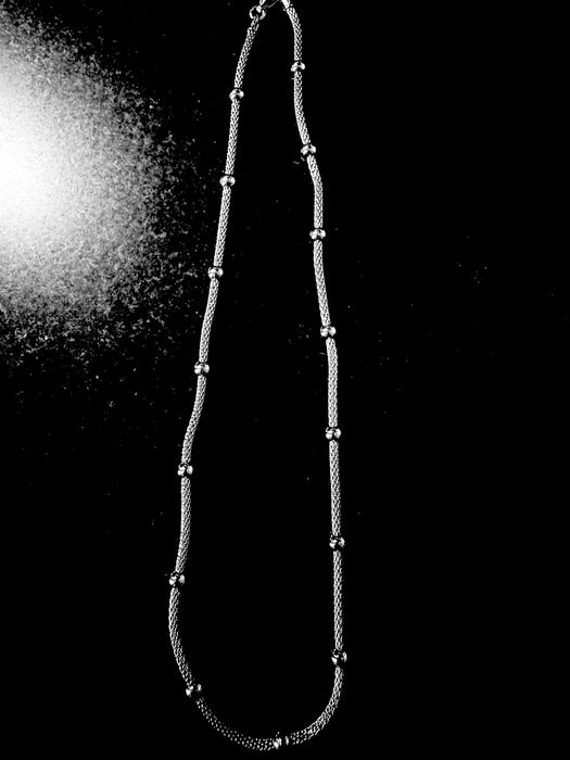 Fio de prata para senhora.