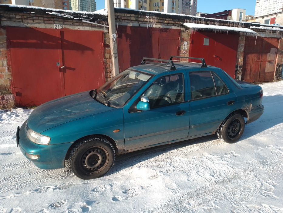 Багажник на дах Kia Sephia 1