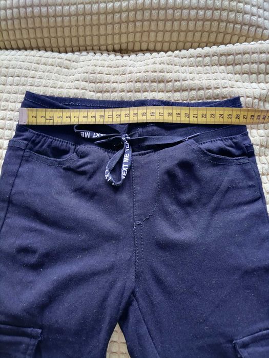 Spodnie legginsy dziewczęce czarne typu bojówki rozm 134
