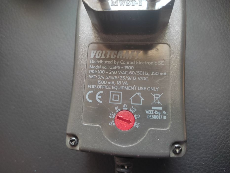 Блок живлення,питания на 3/4,5/5/7.5/9/12 вольт.1 ампер.з Германії.