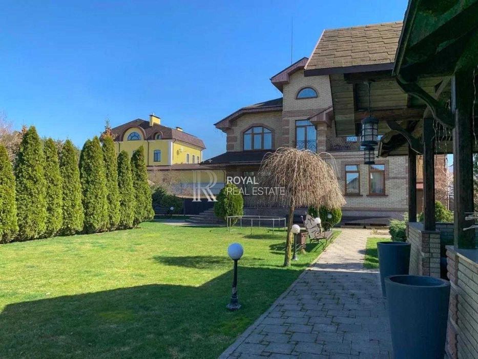 Оренда Будинок Київ Бортничі 6 кімнат 530 м² 25 соток Бомбосховище Басейн з підігрівом Газ Камін Охорона BBQ Навіс на 3 авто Інтернет