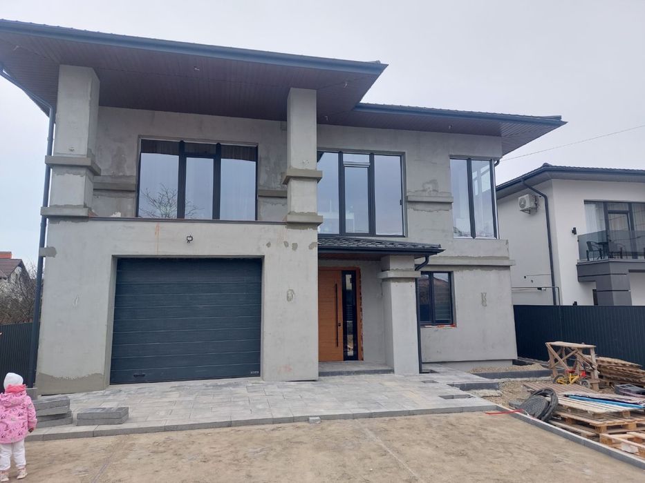 Утеплення фасаду,  декоративна штукатурка, імітація цегли, дерева