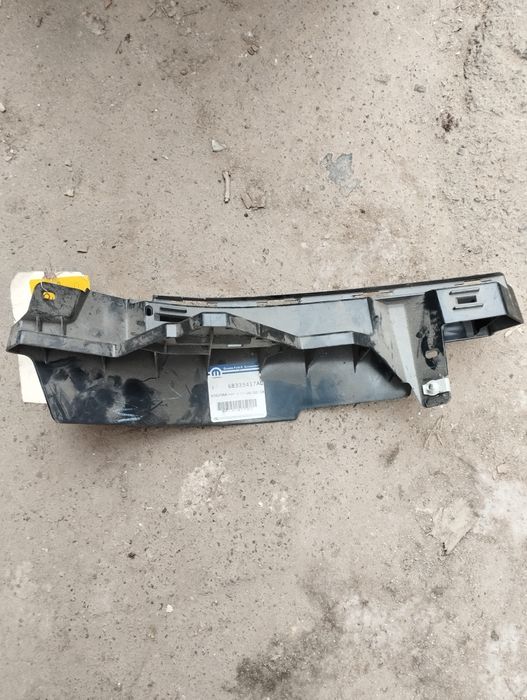 Кріплення бампера ліва Dodge Ram