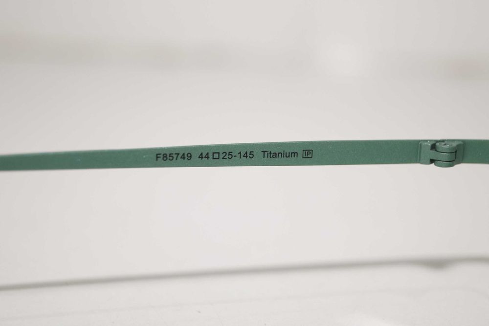 1687 Kolorowe okulary tytanowe oprawki okrągłe do komputera zerówki