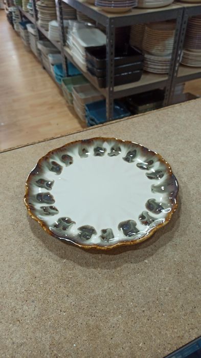 Andorinha em cerâmica louça