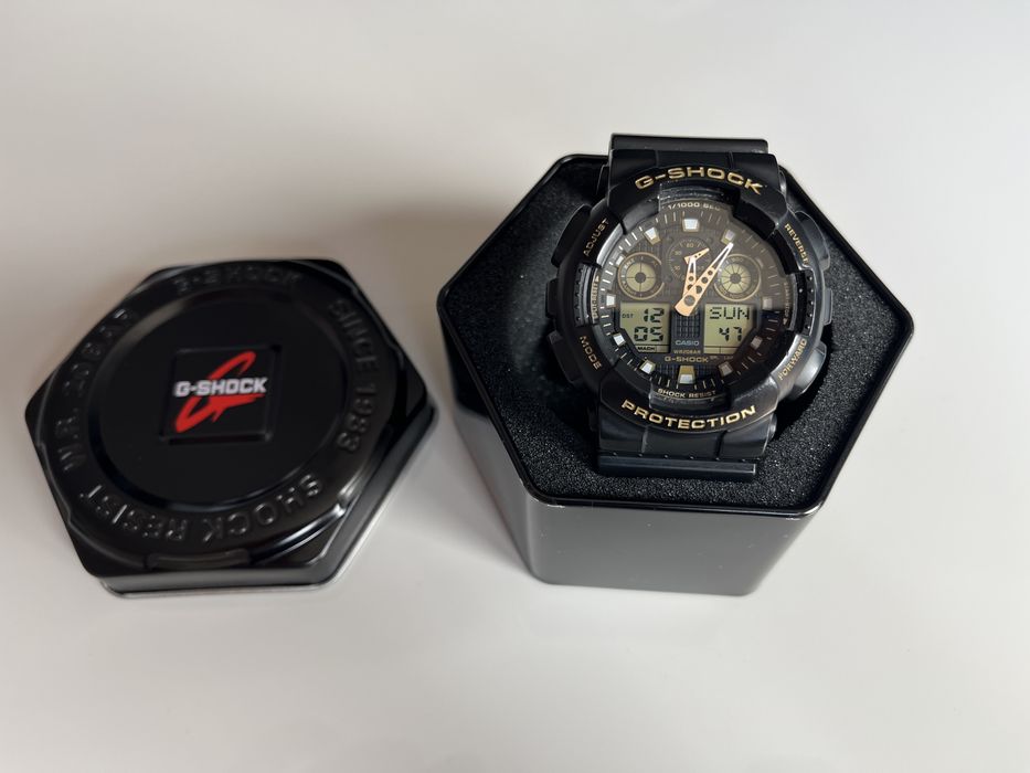 Zegarek CASIO G-SHOCK  GA-100GBX czarno złoty sprawny wodoszczelny