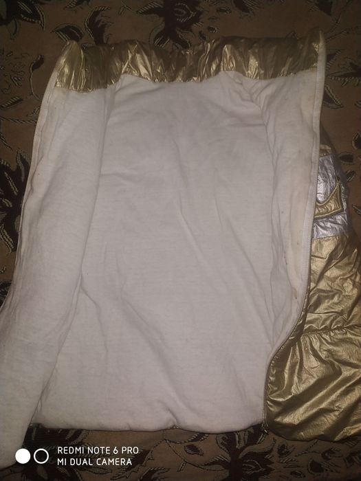 Жилетка утеплена осіння