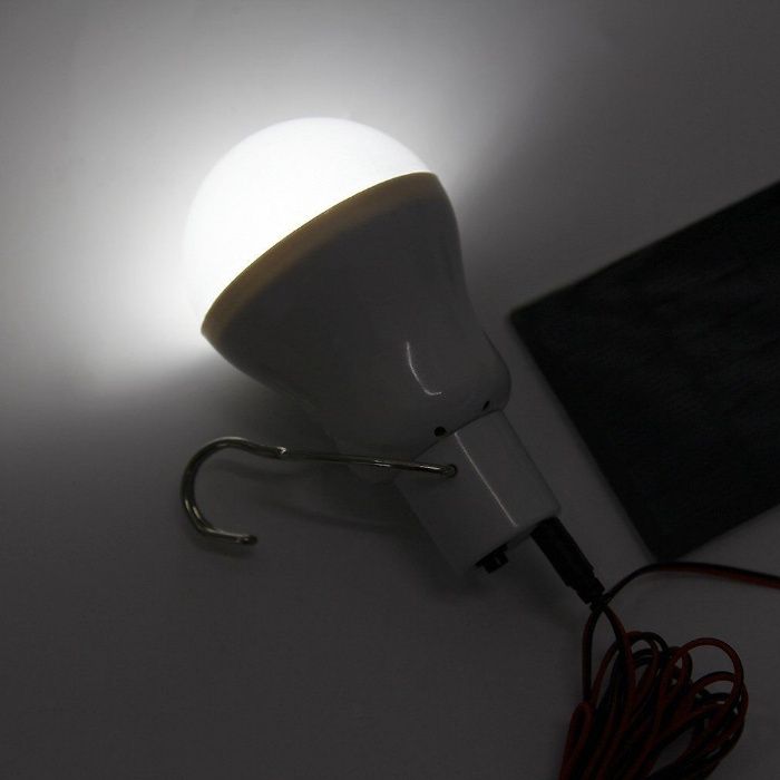 Candeeiro Led  portatil com bateria e painel solar (micro usb) -novo