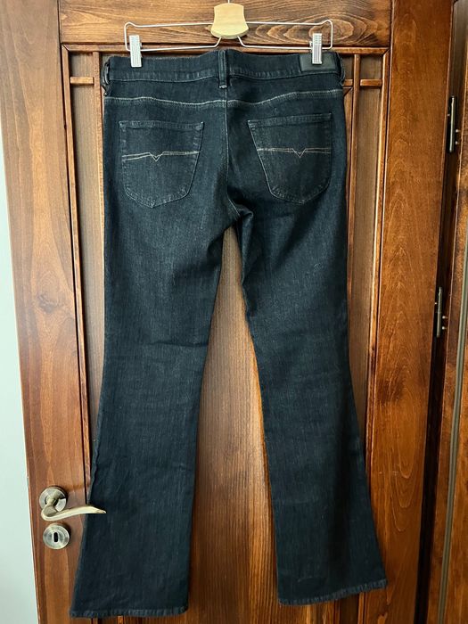 Diesel markowe jeansowe spodnie modne dzwony niski stan rozmiar 38 M