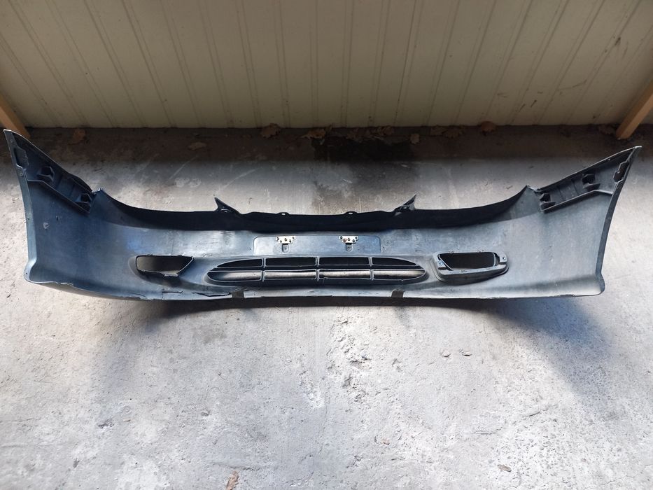 Бампер  Geely CK 1, CK3 сірого кольору.