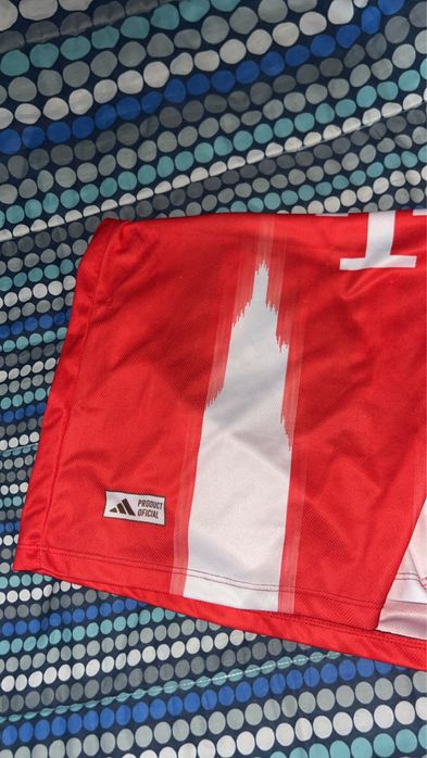 T shirt de futebol con frqse de cria