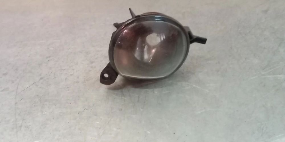 FAROL DE NEVOEIRO TOYOTA COROLLA E12 / COROLLA VERSO AR10 - ESQUERDO
