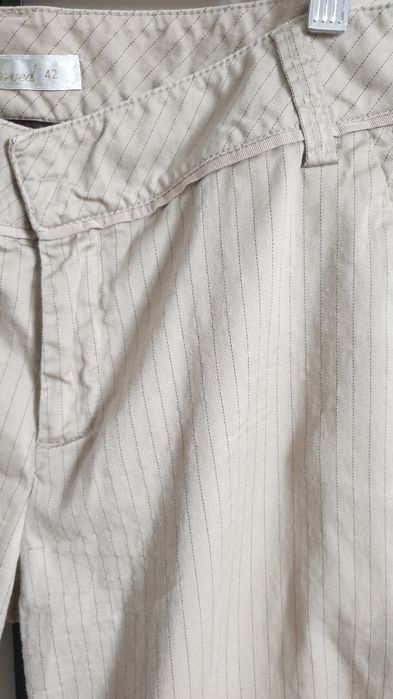Eleganckie spodnie Reserved roz. 42