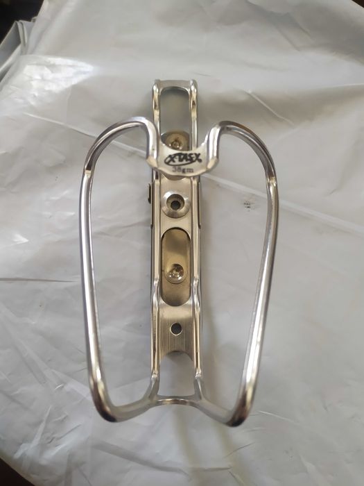 X-TASY koszyk na bidon Aluminiowy Zawias Polecam