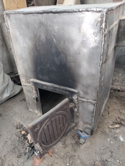 Котел твердопаливний з нержавіючої сталі.