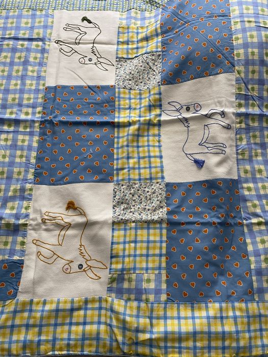 Lençóis e coberta para bebé