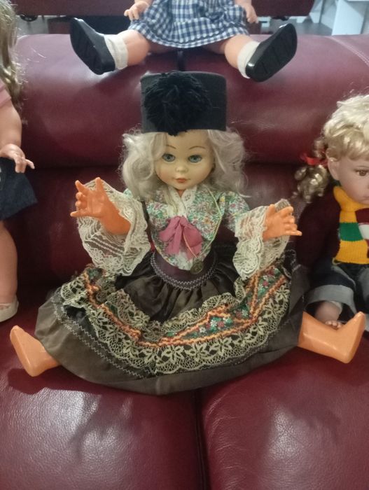 Bonecas antigas como novas