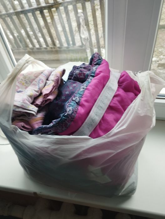 Віддам пакет дитячих  речей безкоштовно