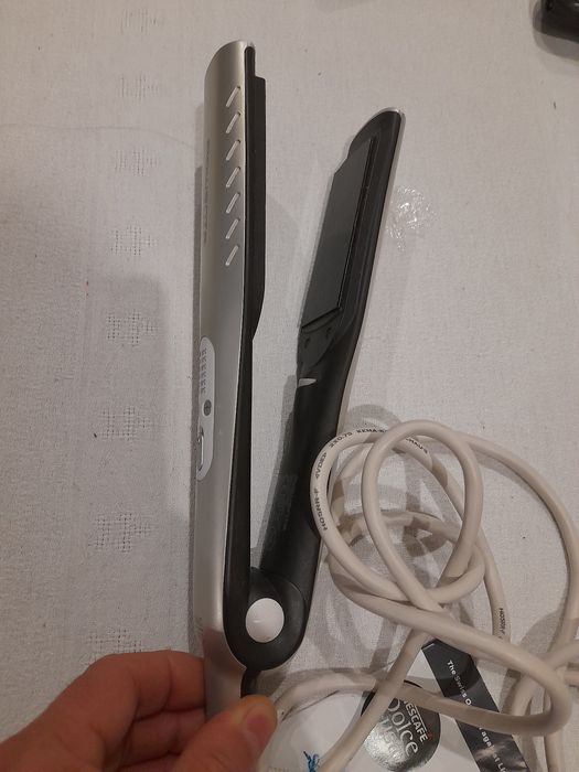 Alisador de cabelo rowenta.