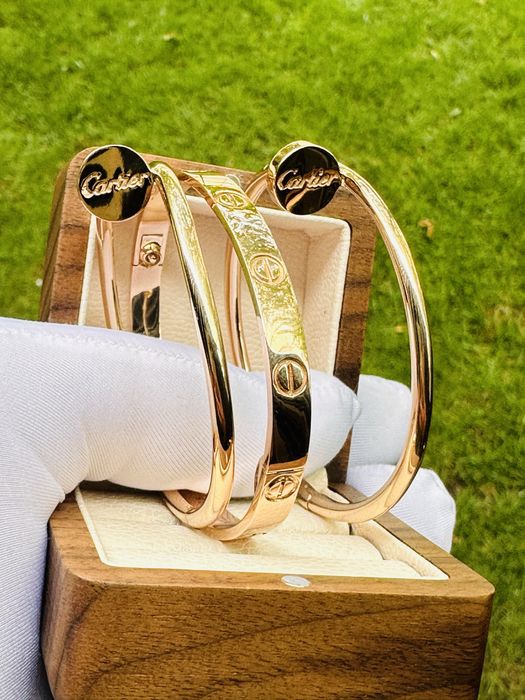 Золотые браслеты cartier 585