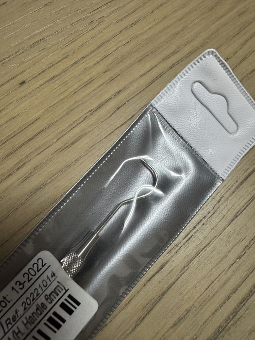 Sonda curva exomed para medicina dentaria