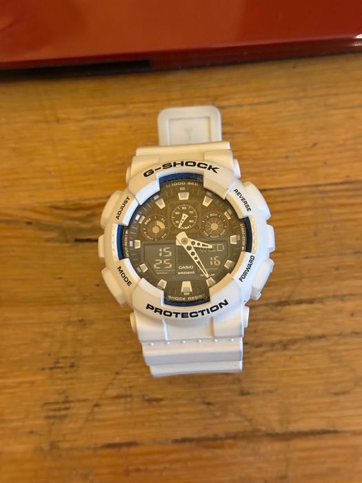 Zegarek Casio G‑SHOCK GA‑100B‑7AER biały