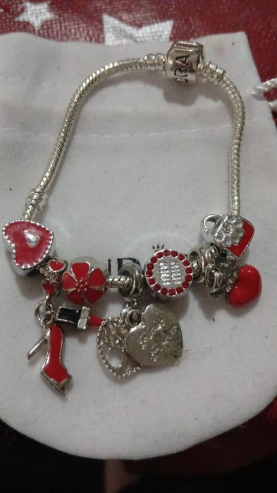 Pulseira da P com 7 pingentes