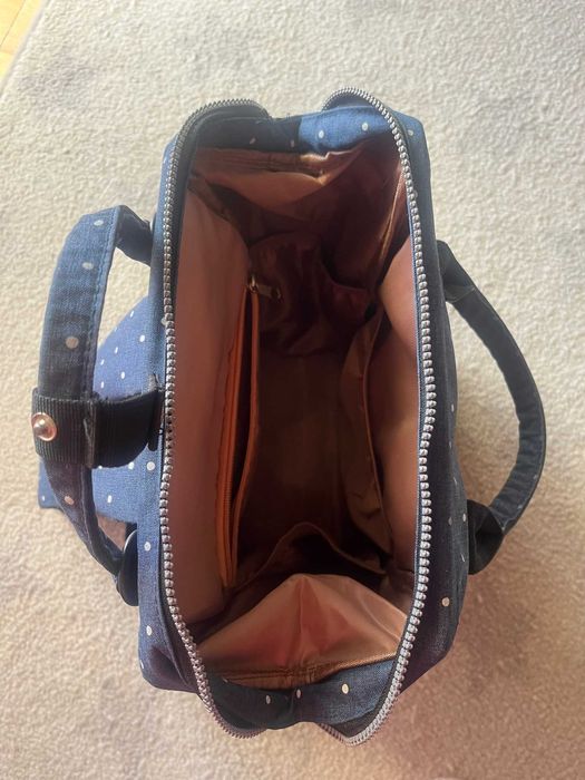 Mochila de maternidade que dá para pendurar no carrinho