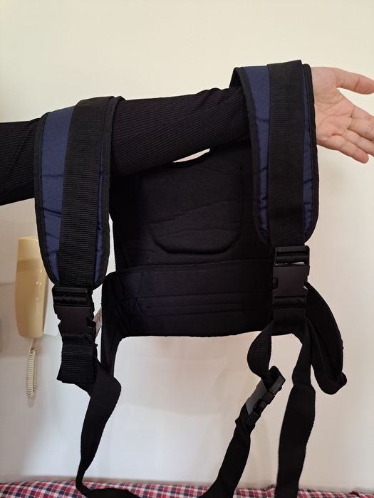 Colete para cadeira de rodas