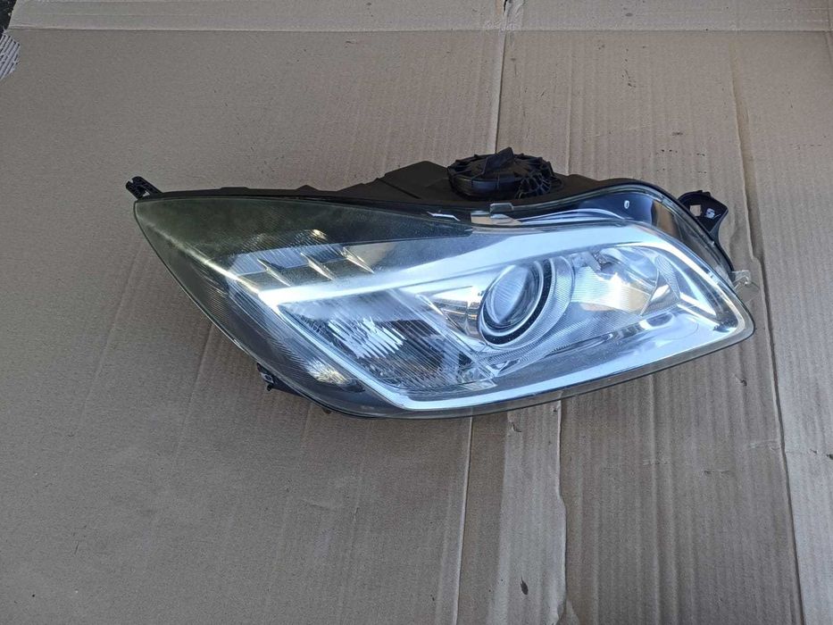 Opel Insignia A 08-13r.lampa prawa Bi-Xenon skrętny oryginał.228.31929