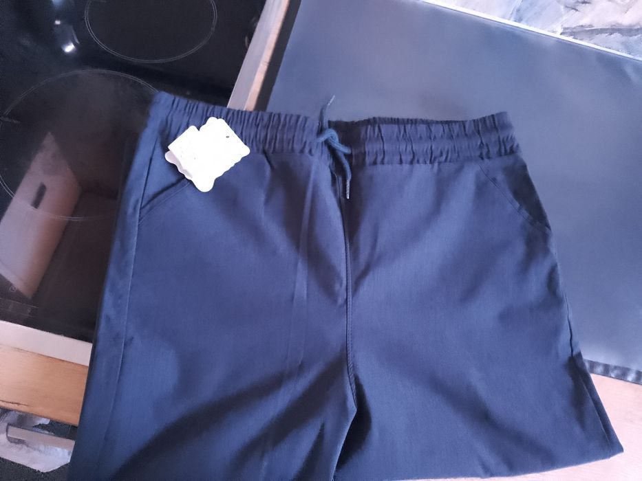 Nowe spodnie 2xl ciemny granat na gumce 3/4 nogawka