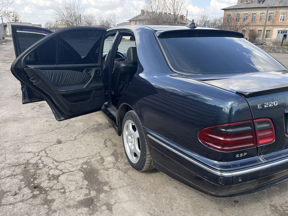 Мерседес Бенз 210