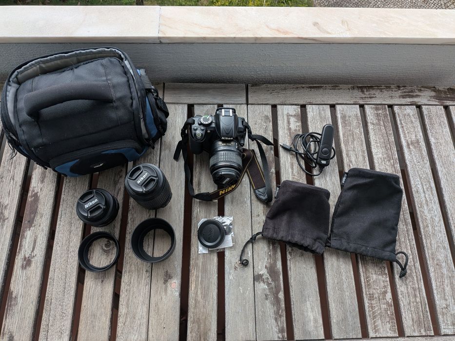 Nikon D3100 com bolsa e objetiva