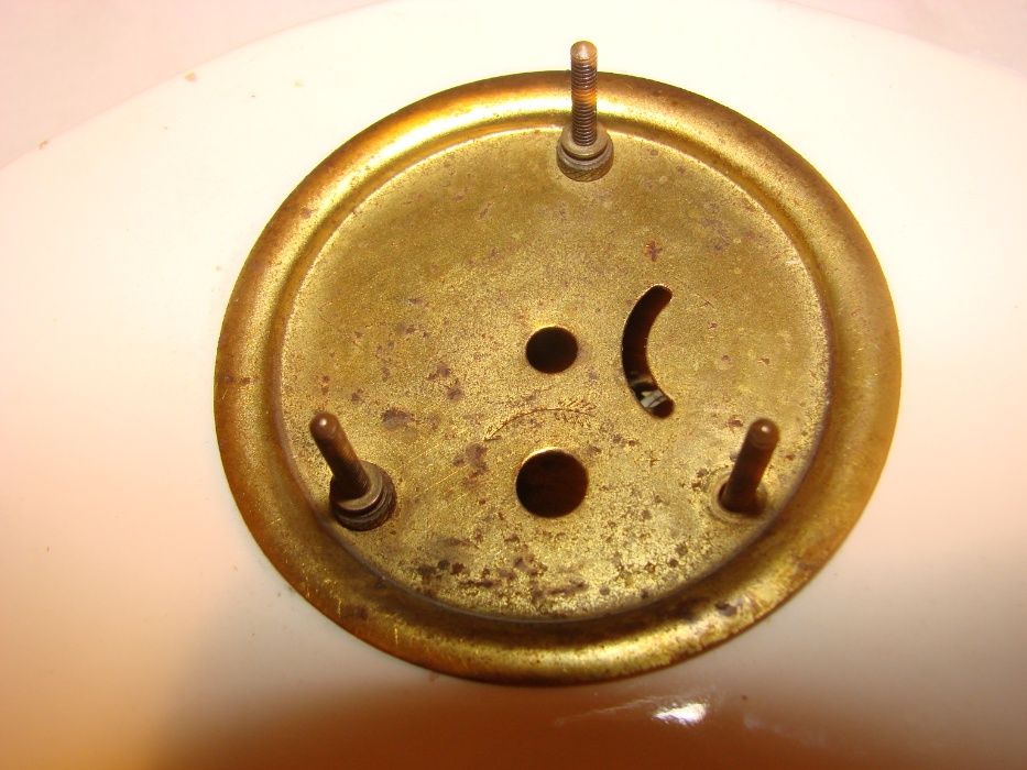 stary, porcelanowy zegar kominkowy