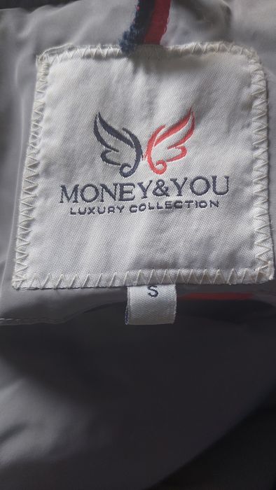 Продам женский пуховик