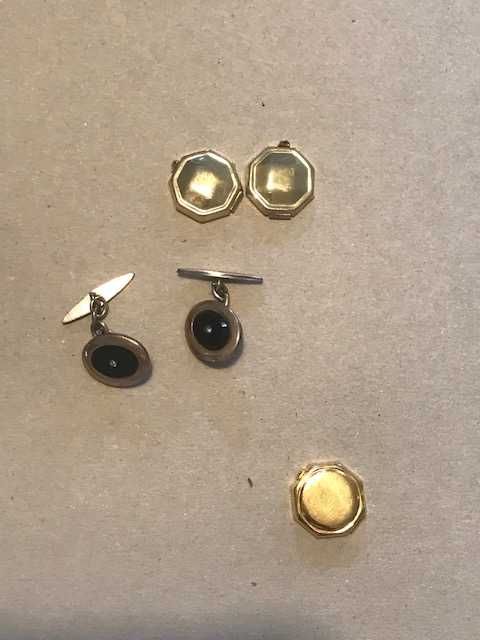 Botões de punho antigos