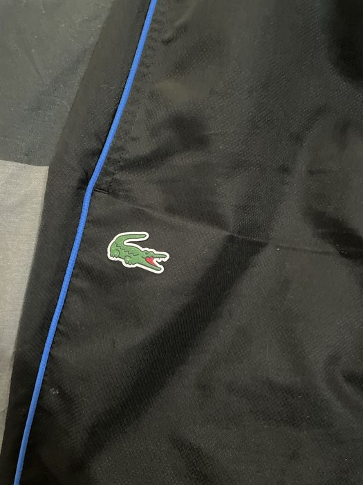 calças lacoste sport pretas e azuis