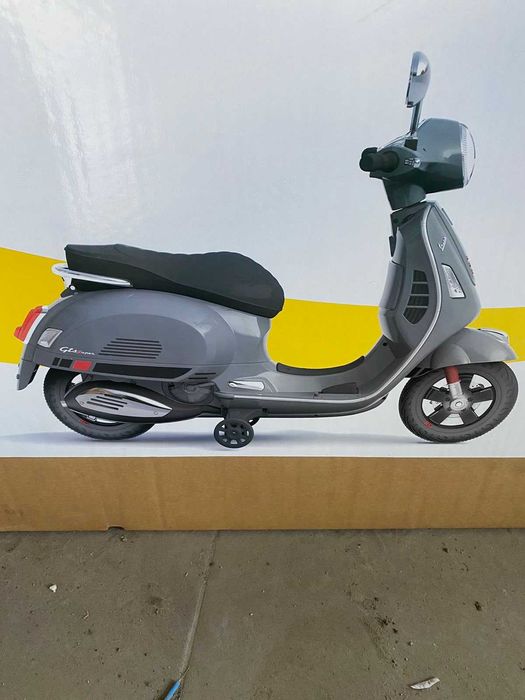 електромобіль дитячий мотоцикол допоміжні колеса