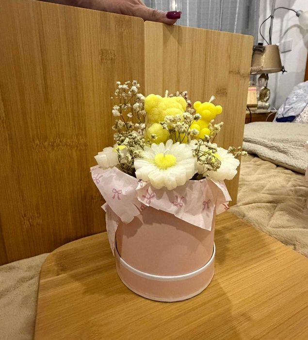 Vasos de flores em vela