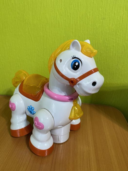 Музичний коник. Конячка що їздить. Кінь