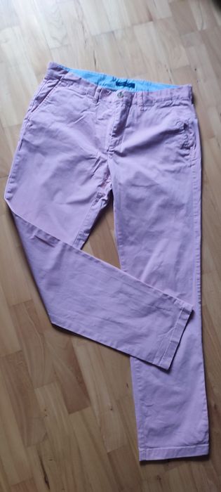 Tommy Hilfiger spodnie męskie chinosy 34/34 jasny róż
