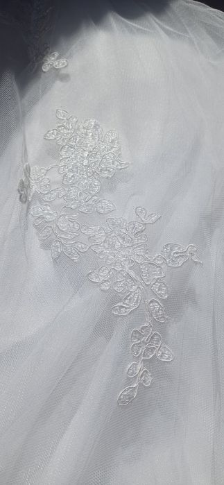 Suknia ślubna White One.